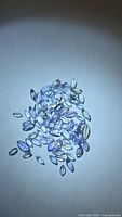 Group of marquise-cut tanzanites showing overall quantity and color