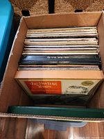 Top view of box showing stacked vinyl LPs with The Swing Years album in front