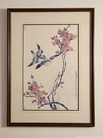 Full view of framed print on wall showing artwork, matting and frame