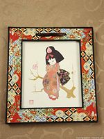 Front view of framed Japanese print showing full artwork and patterned border