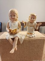 Both Lenox angel figurines front view