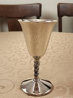 Full view of goblet showing shape, finish and twisted rope stem