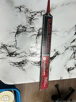 Full view of boxed Heller Black Master rasp