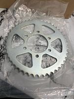 Front view of silver 46-tooth sprocket hub with part label visible