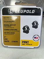 Front of sealed Leupold PRW2 package showing product info and images of rings