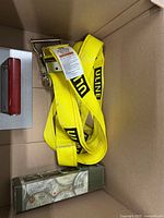 Top view showing Uline strap and steel plate tool