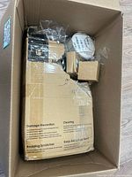 Box overview showing packaged items and loose components