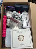 Top view showing multiple boxed items and accessories