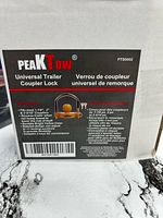 Retail box front showing Peaktow branding, product image, model PTS0002, feature list