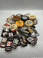 Pile of bottle caps and assorted openers
