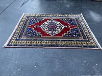 Full view of Yahyali hand knotted rug laid flat on ground