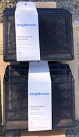 Two packaged Brightroom hanging mesh file sorters on cardboard