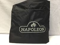 Front view of folded black Napoleon BBQ cover showing logo