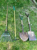 All four tools laid out—leaf rake, bow rake, round shovel, square shovel