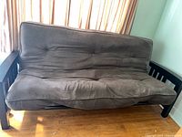 Front view of futon showing full frame and cushion