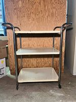 Front view of Cosco three-tier cart showing overall structure