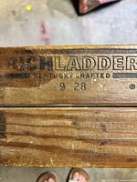 Brand stamp Rich Ladder Kentucky Crafted 9 28 on top platform