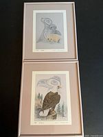 Both framed Sue Coleman prints stacked, showing frames and mats