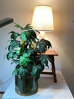Bench, lamp, brass planter with faux plant together