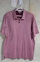 Front view of light purple Canali quarter-zip polo on hanger