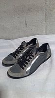 Pair of Prada grey and silver sneakers, full view