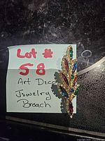 Front view of brooch with colored rhinestones