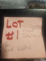 Handwritten lot note identifying Royal Doulton The Last Waltz