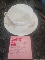 Teacup and saucer overview on countertop