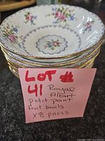 Stack of eight Royal Albert Petit Point fruit bowls