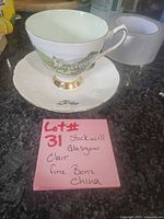 Teacup and saucer set on counter