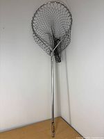 Full view of Frabill skimmer scoop showing mesh net and handle