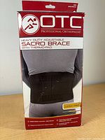 Front of retail box showing OTC branding, model 2886, image of brace