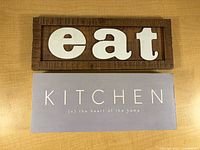 Front view showing both plaques and text