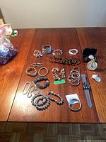 Overall view of bracelets and watches on table