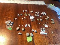 All earrings laid out on table