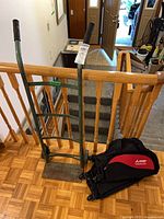 Full view of dolly with carrying bag on floor