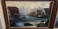 Framed oil painting showing whole harbour scene