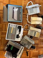 Group shot of all five devices showing relative size and accessories