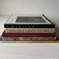 Stack of six art books showing covers and spines