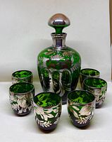 Front view of decanter and six matching glasses