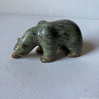 Side view of soapstone bear carving