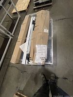 Two electric base plates strapped together on pallet