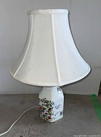 Full view of lamp with shade, showing height and overall appearance