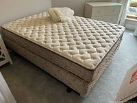 Double mattress, box spring, pad and frame in bedroom