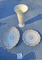 Full lot view with Wedgwood vase and two Limoges platters