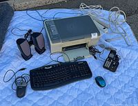 Group shot showing printer, keyboard, mice, speakers, phone, power bar