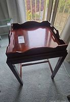 Full view of tray table from front showing removable tray on stand