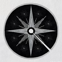 Front view showing embroidered silver starburst pattern on black fabric with edge trim