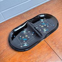 Top view of divided glass nut dish showing hummingbird and floral pattern