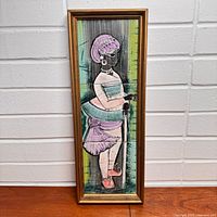 Full front view of framed three-tile artwork